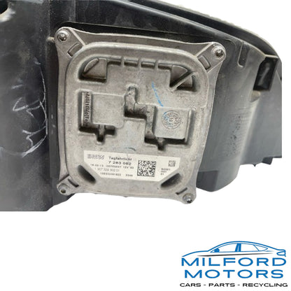 Used Driver-Side Adaptive/Xenon Headlight Assembly Fits 2012-2013 BMW X5 3.0L